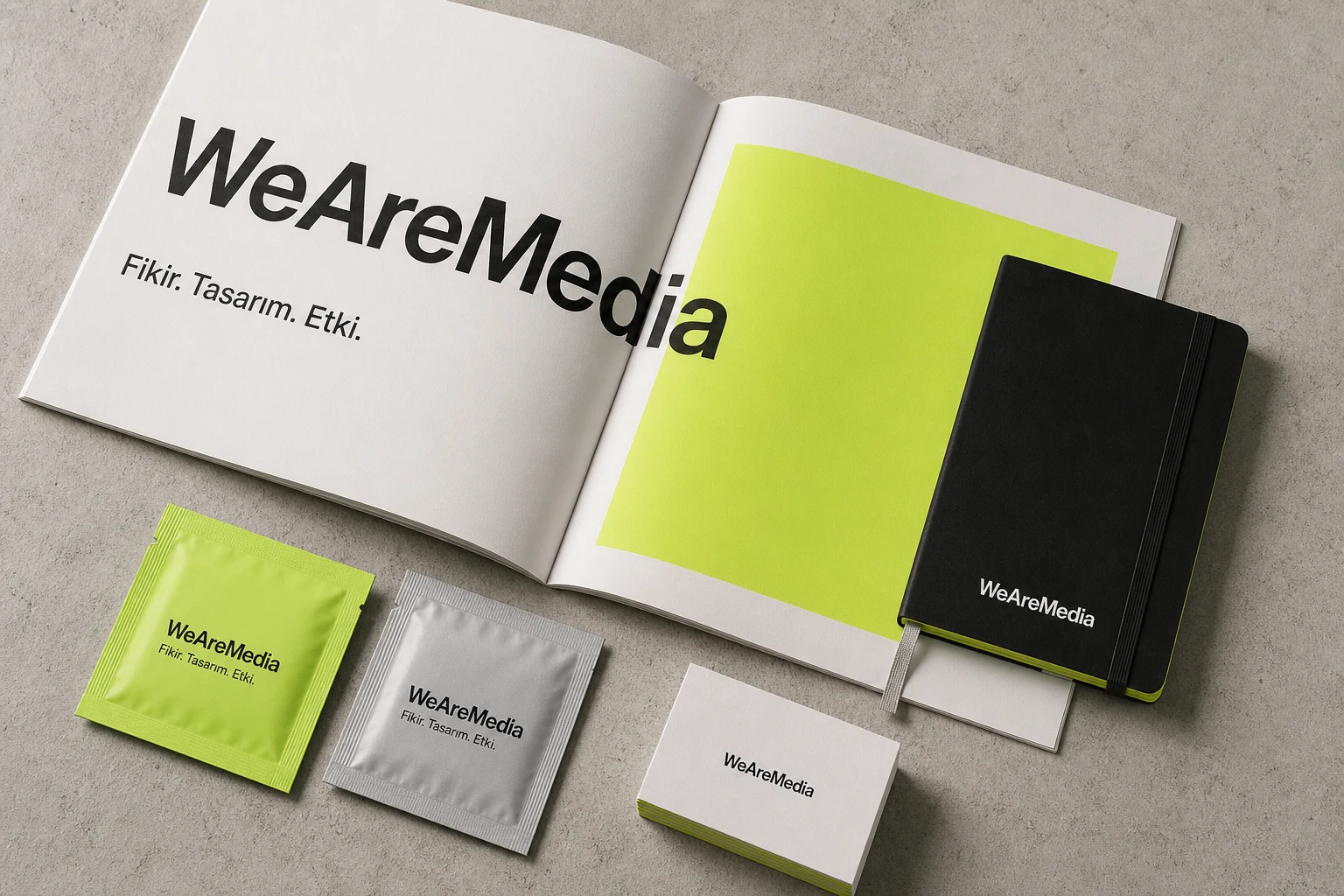 WeAreMedia reklam ajansı için hazırlanan broşür, defter, kartvizit ve ıslak mendil konsepti